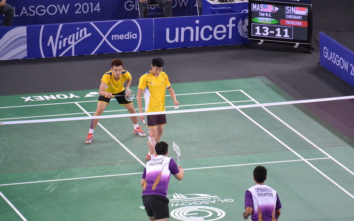 Promo photo: doubles match on a Yonex court